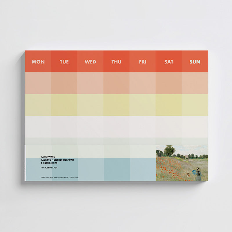 Colorful monthly deskpad with monet artwork on the white background