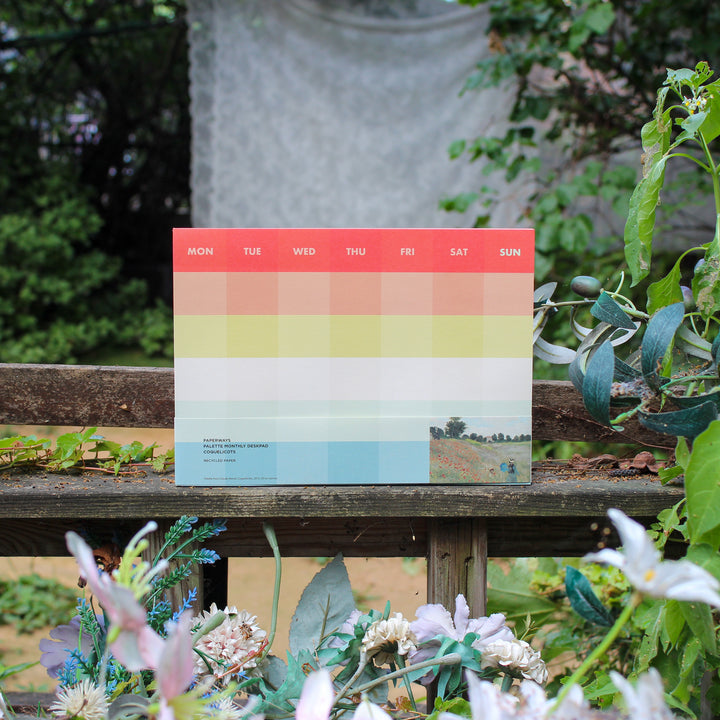 Colorful monthly deskpad on the bench