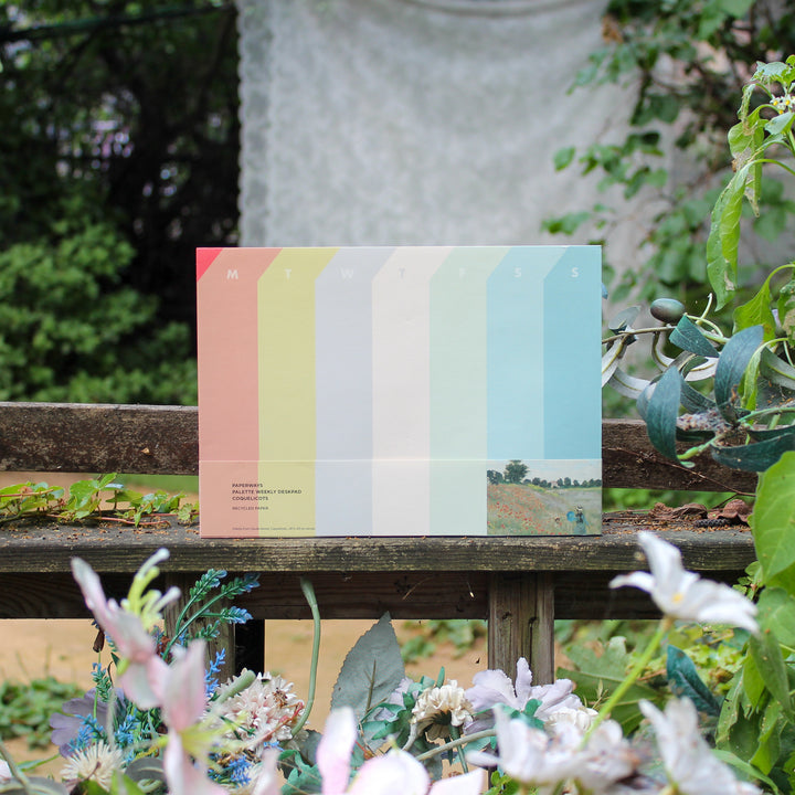 Colorful weekly deskpad on the bench