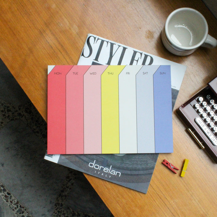 Weekly deskpad on the table