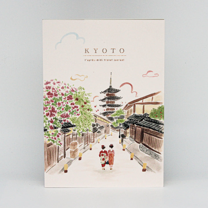  Journal of Kyoto with traditional Japanese architecture and cherry blossoms on a white background