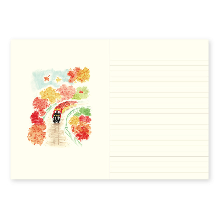 Open notebook spread featuring a watercolor illustration of a red train traveling through colorful autumn trees on the left page, with a lined note-taking page on the right.