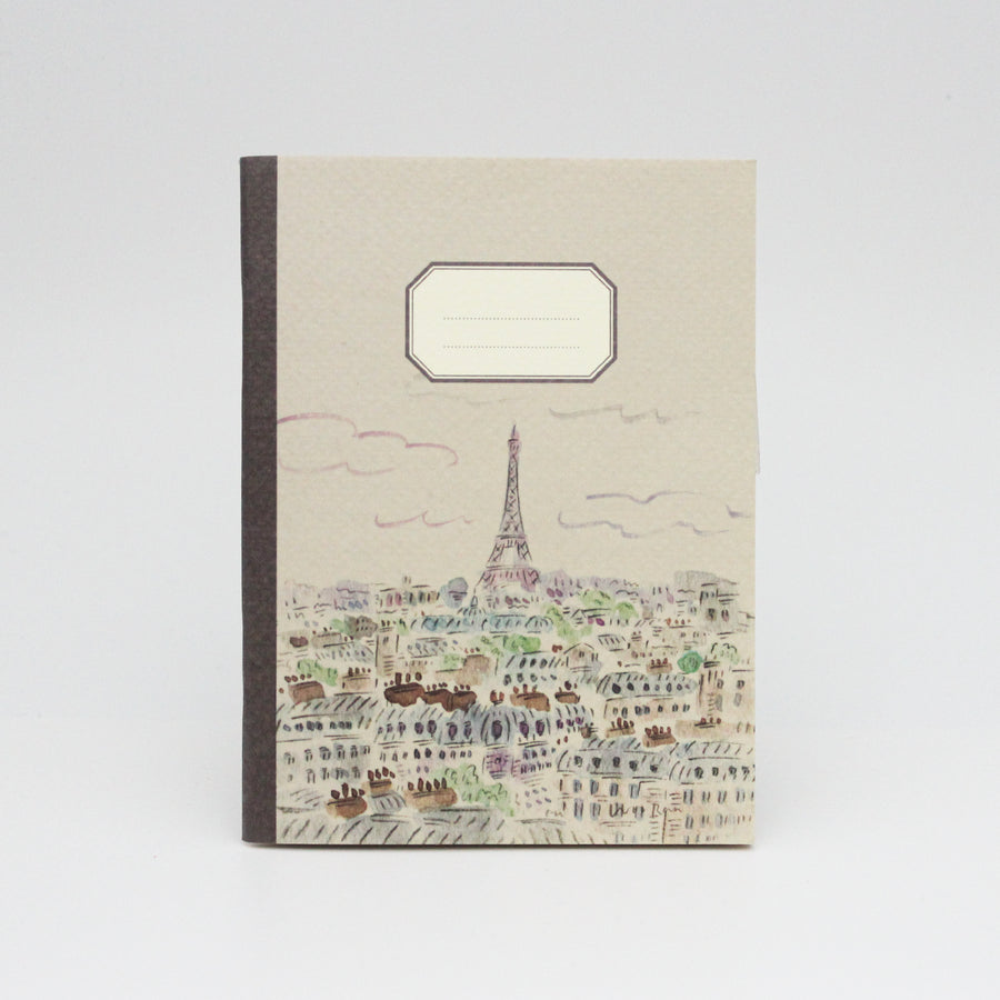 Notebook with Eiffel Tower design on a white background
