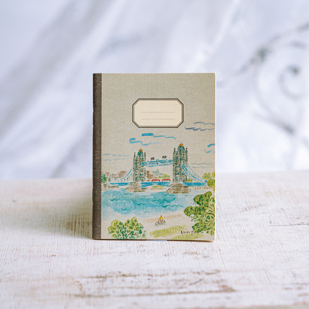 Notebook with a design of Tower Bridge on a white surface
