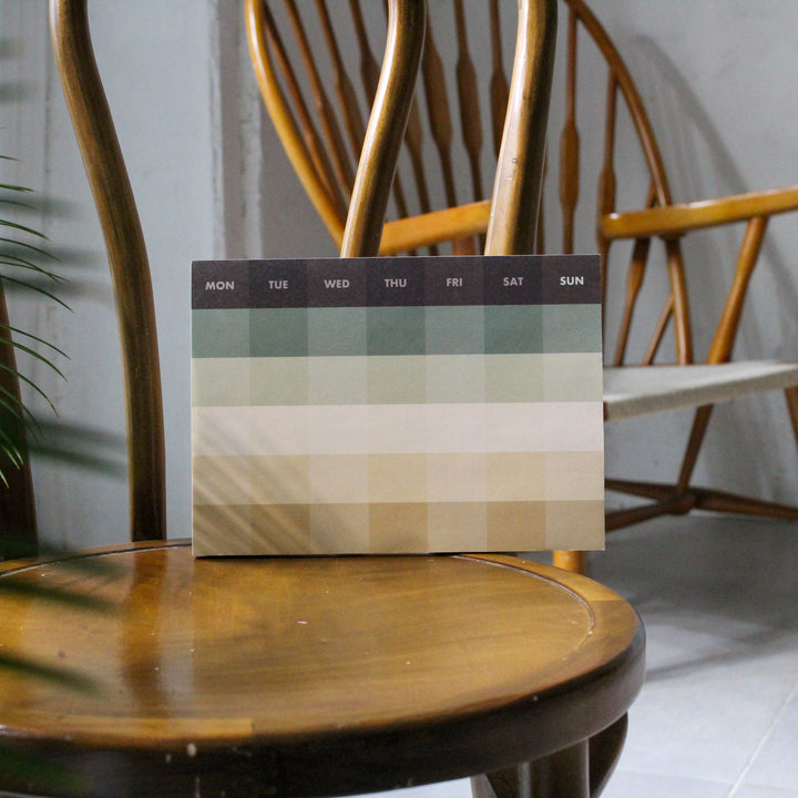 Monthly deskpad on the chair