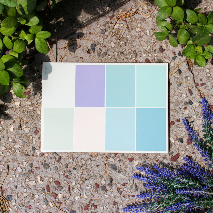 Desk Notepad a textured ground with plants
